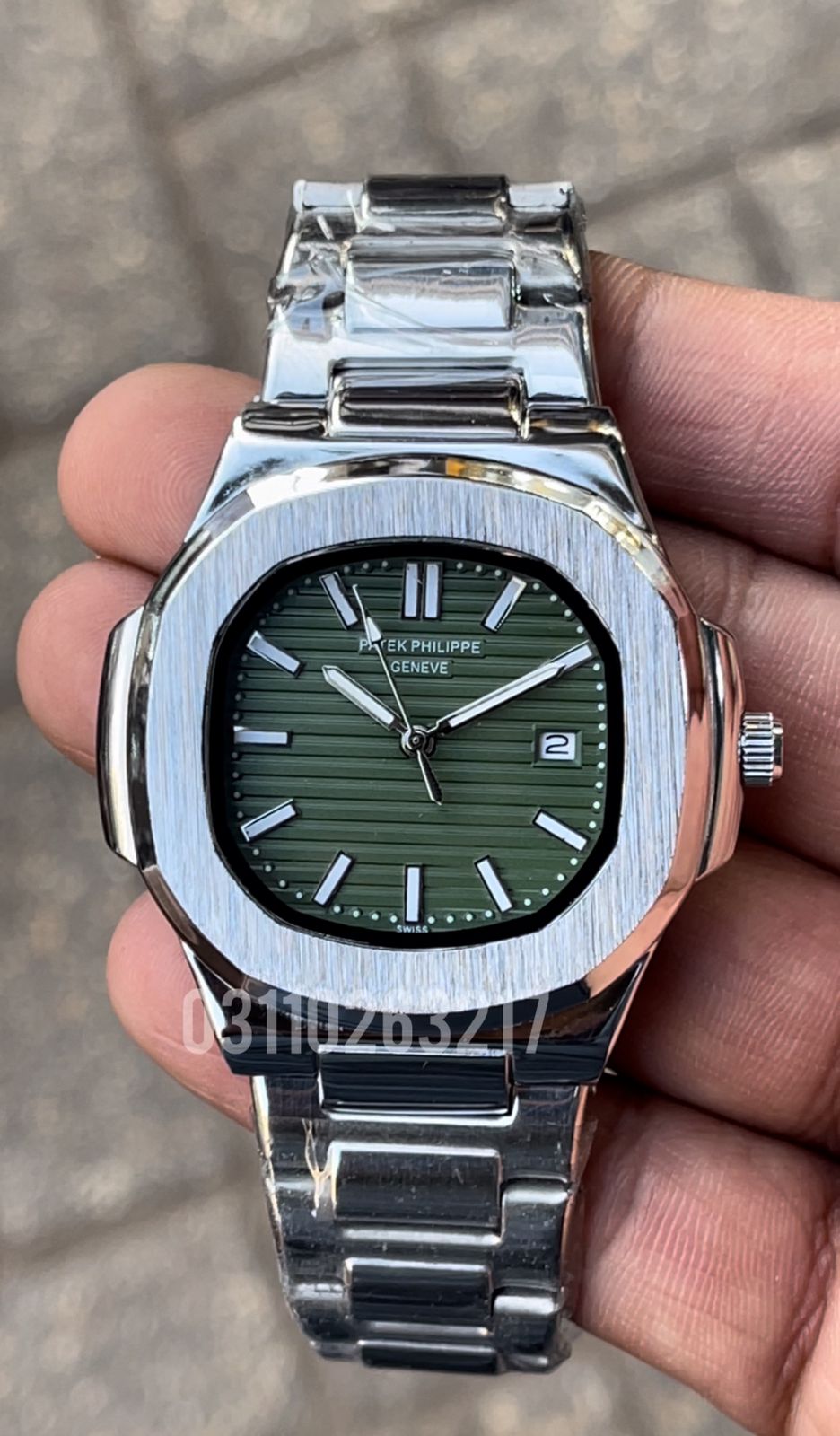 PP Silver with Green Dial
